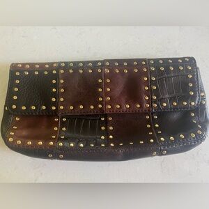 Michael kors Studded leather Patchwork Clutch. 12 x 6x 2